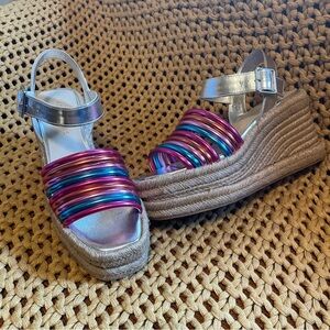 Kenneth Cole metallic rainbow platforms.
